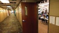 The hallway is quiet as Nicole Brew teaches second graders in her classroom.