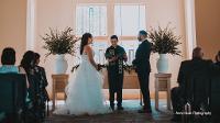 Couple exchanging vows at alter in Hopper Danley Spiritual Center