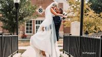 Couple kissing outside of hopper danley