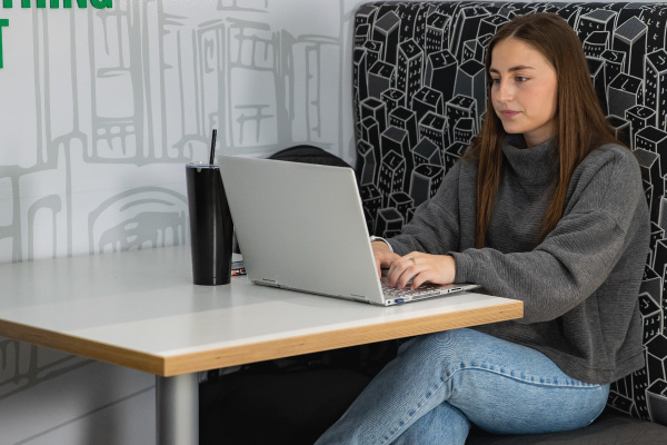 Student working on their laptop