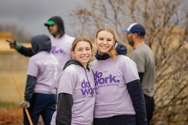 Volunteers wearing DO WORK shirts