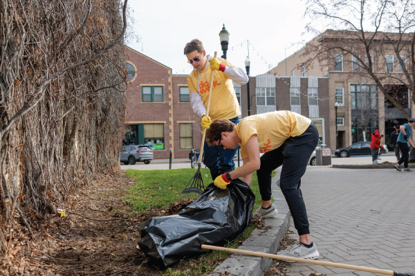 Volunteers wearing DO WORK shirts