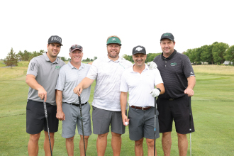 group of men golfing