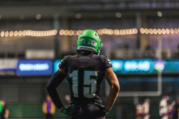 Football player looking onto field