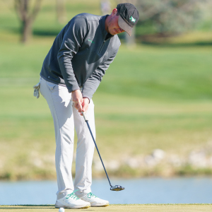 Man playing golf