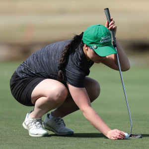 Woman playing golf