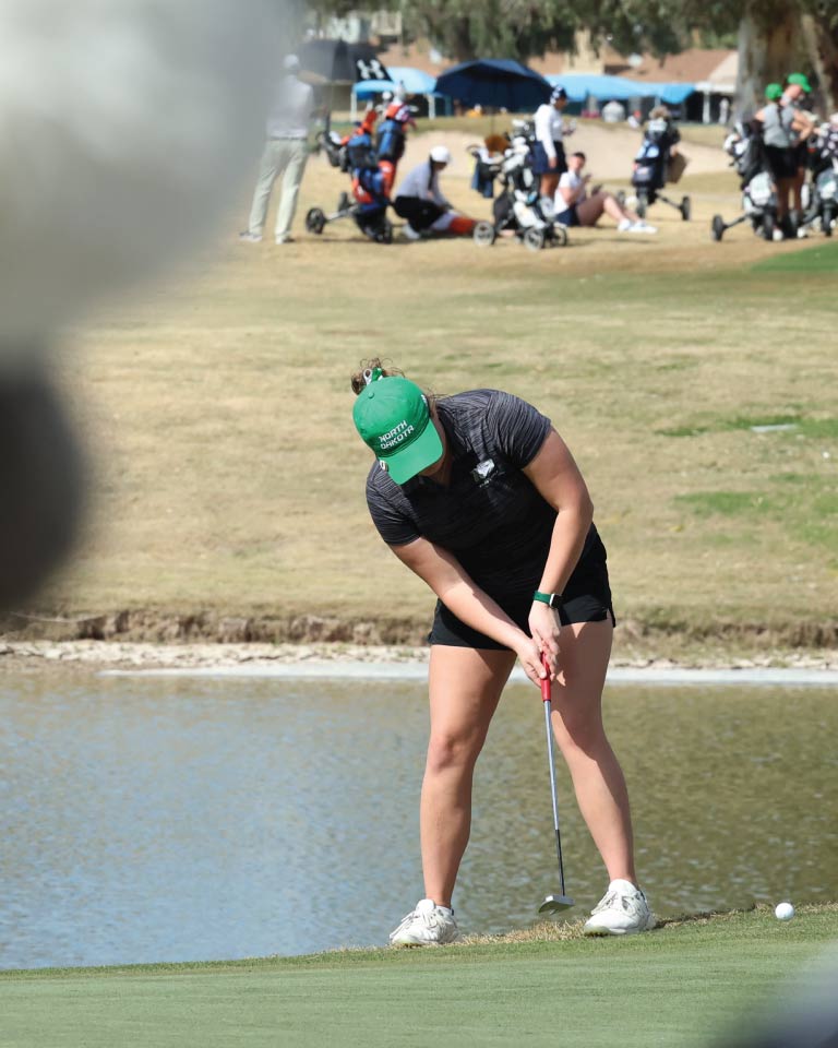 woman golfing