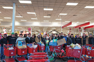UND Football team shopping for gifts