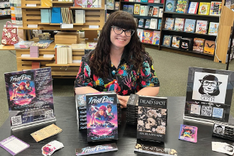 Angela Penland pictured with her book "The Dead Spot"