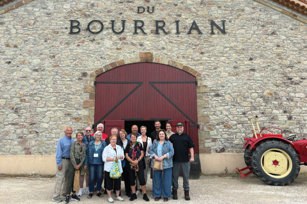 Alumni travel group at a winery