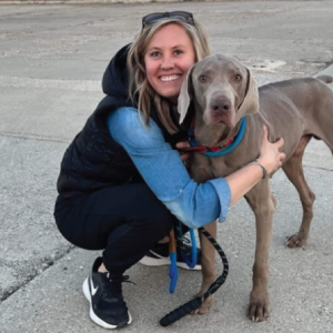 Leslie Rethemeier with black dog