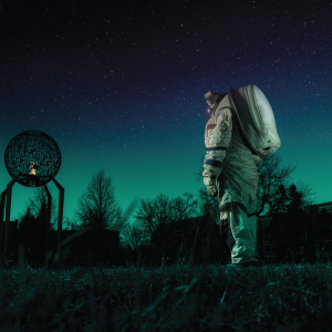 space suit on campus at dusk