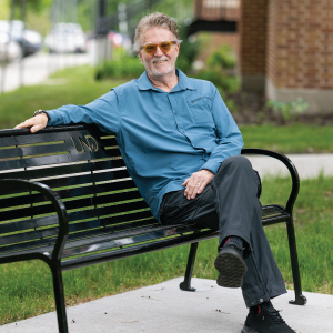 curt tofteland sitting on bench