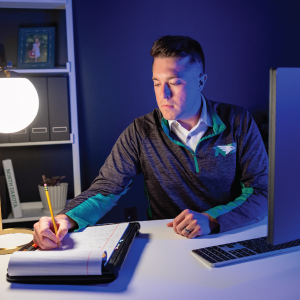 student studying in the dark
