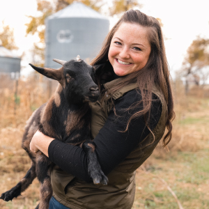 person holding goat