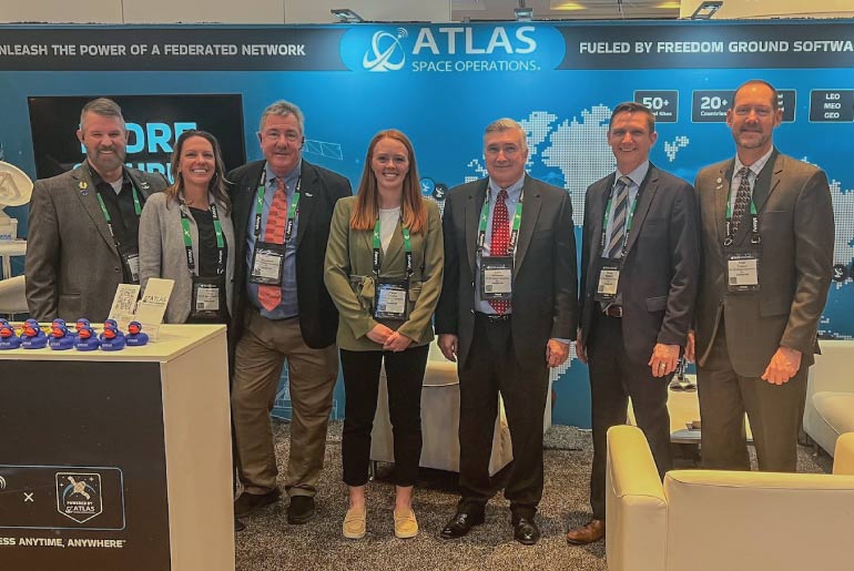 Paige Webster (middle) and Atlas Employee Group Photo