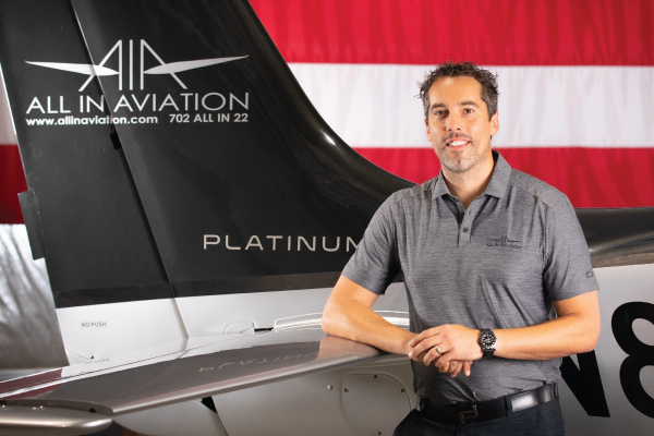 Paul Sallach pictured with aircraft
