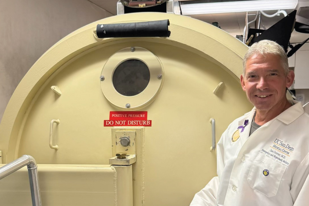 Pete Witucki shows off the hyperbaric chamber