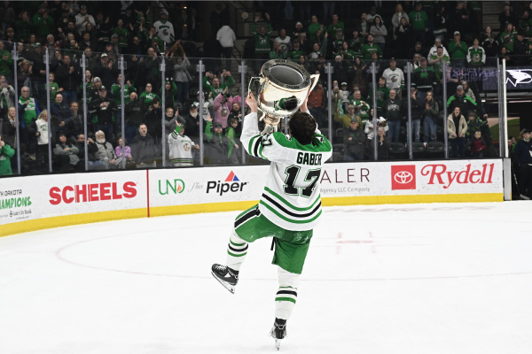 Riese Gaber holding penrose cup