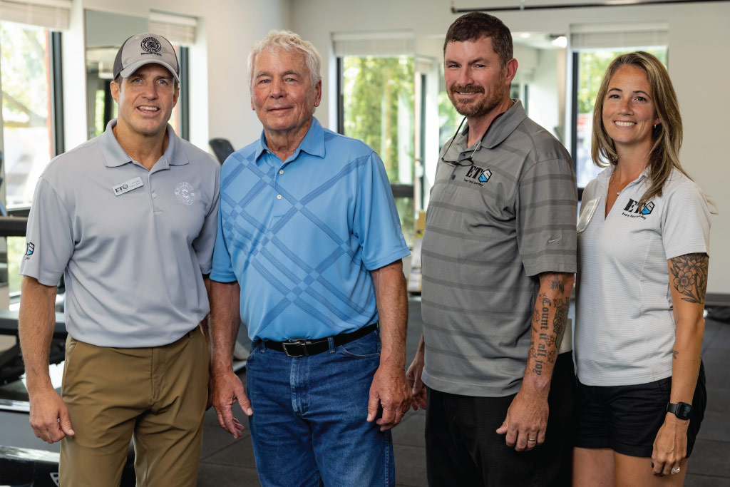 Tip pictured with his two sons and daughter-in-law