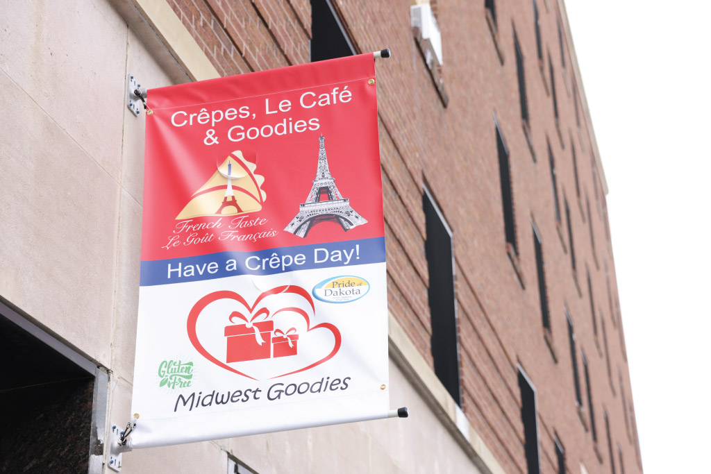 Banner outside of French Taste Cafe