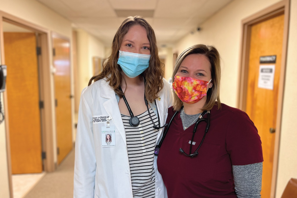 Audrey Smeenk and UND student shadow McKenzie Burke