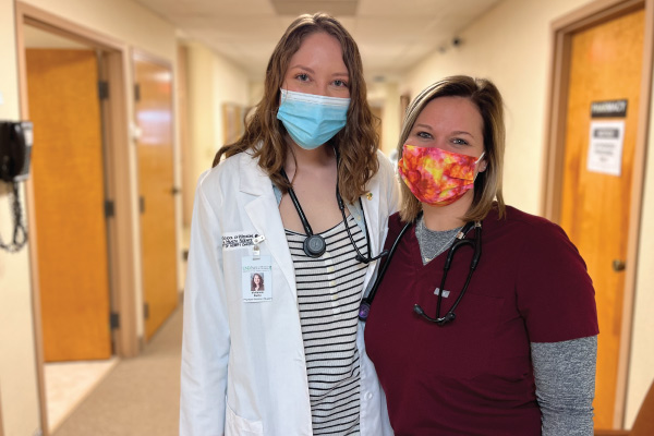 two nurses wearing masks