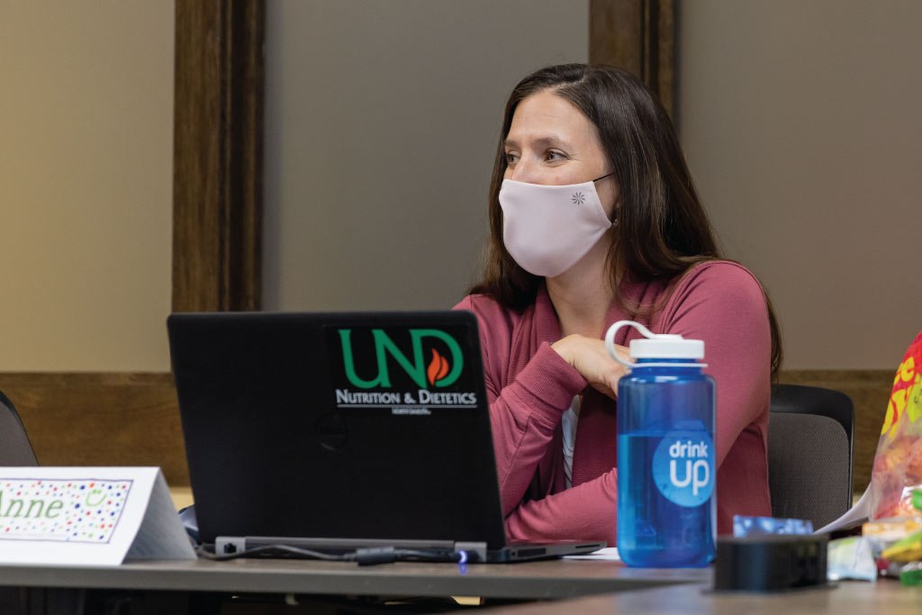 Dr. Bodensteiner sitting wearing a face mask. 