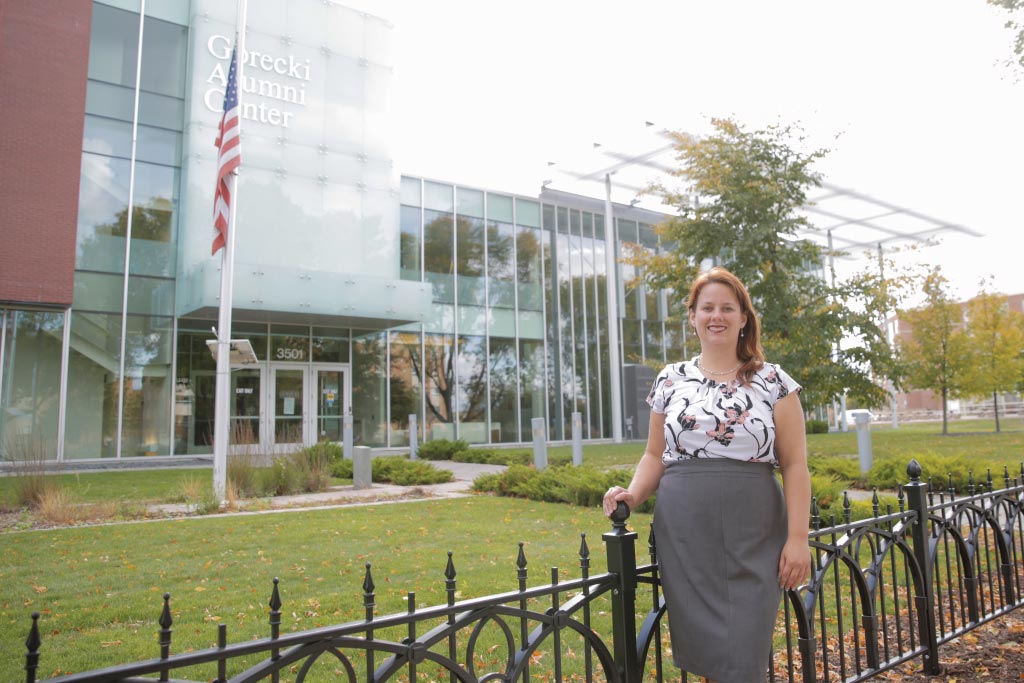 Heather pictured outside of the Gorecki Alumni Center