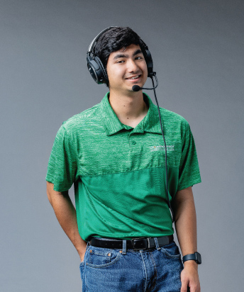 person wearing headset on gray background