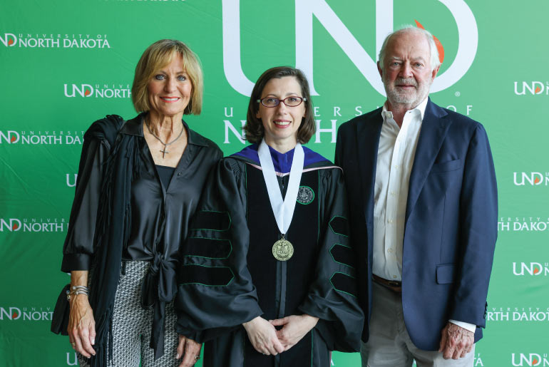 Dr. Simona Barbu pictured with Rick and Jody Burgum